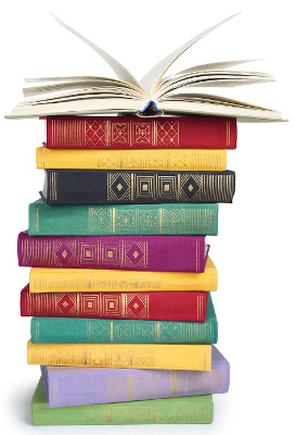 a stack of vintage books with open top isolated on white background
